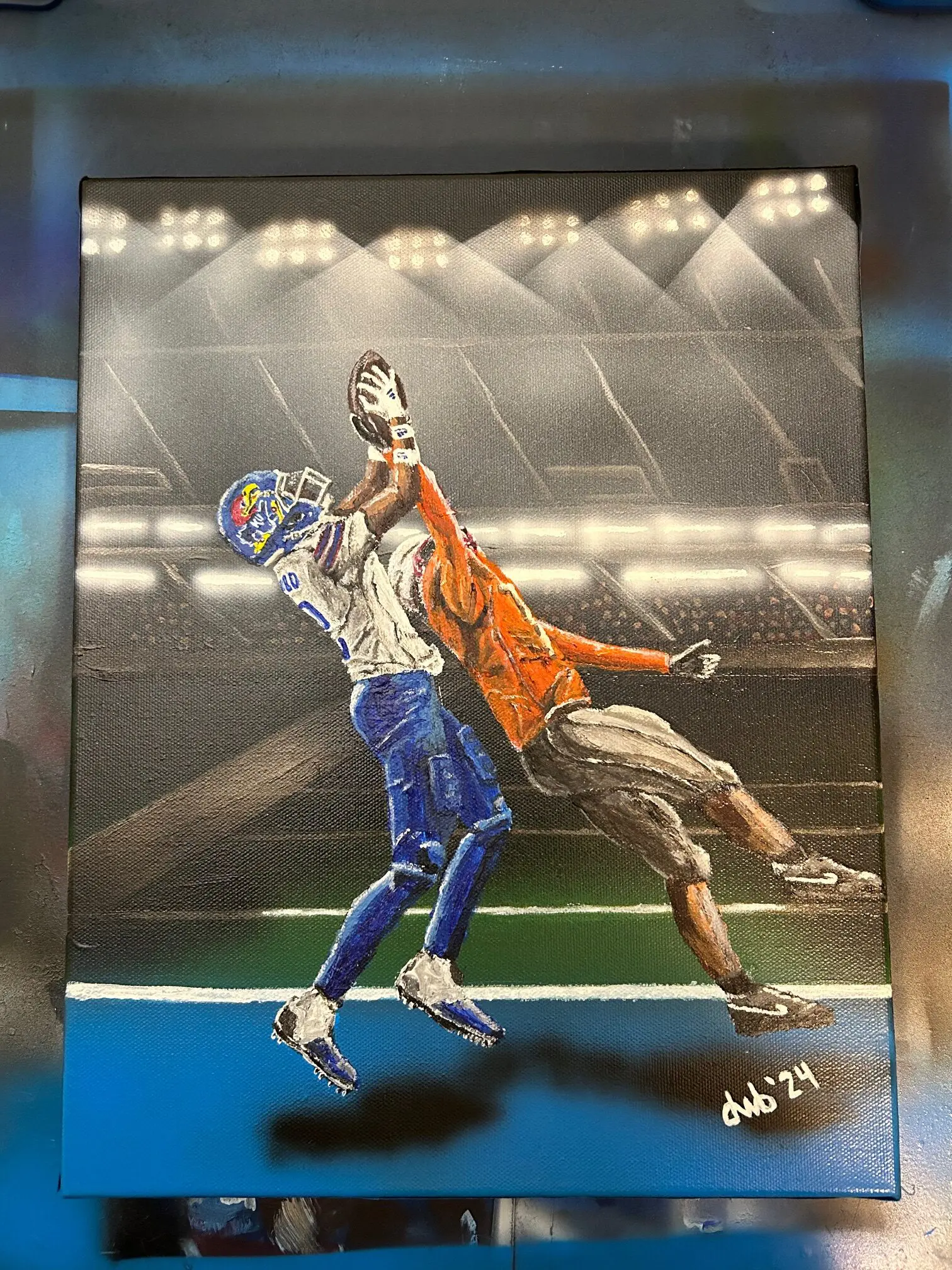 A painting of two men playing football in an arena.